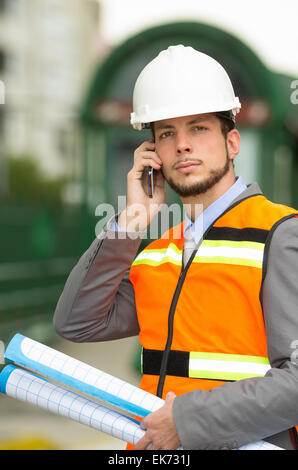 young handsome architect supervising a construction Stock Photo