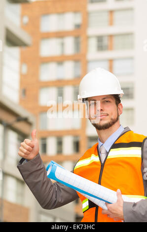 young handsome architect supervising a construction Stock Photo