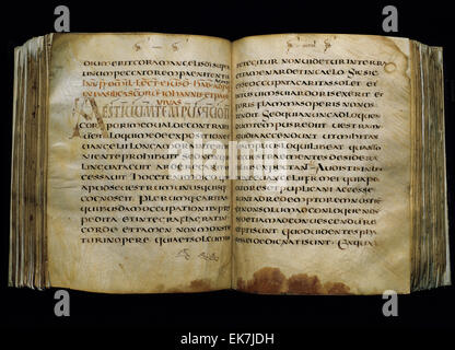 Pope Gregory I (540-604). Manuscript on parchment. Text Gregory I. Contains the last 20 homilies of St. Gregory. Uncial script. From Merovingian Gaul. 7th century. Stock Photo