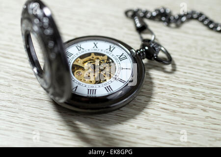 Old  pocket watch on table, Shallow depth of field