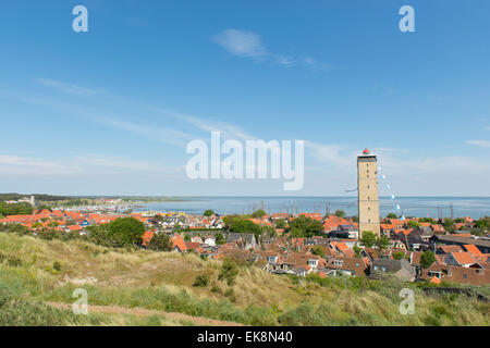 Dutch village with lighthouse at island Terschelling Stock Photo