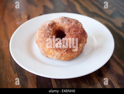 A homemade cinnamon donut from d'Lish by Tish Café in Saskatoon, Saskatchewan, Canada. Stock Photo