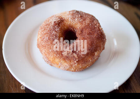 A homemade cinnamon donut from d'Lish by Tish Café in Saskatoon, Saskatchewan, Canada. Stock Photo