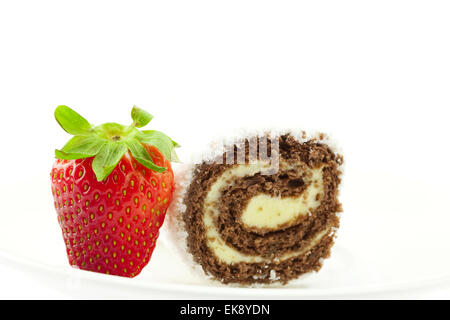 strawberries and cake roll isolated on white Stock Photo