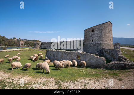 The triangular fortress on the shore of the Vivari channel at Butrint in Southern Albania. Stock Photo