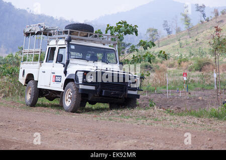 Landrover used by the MAG de-mining team parked by the side of the track next o a minefield in northwestern Cambodia Stock Photo