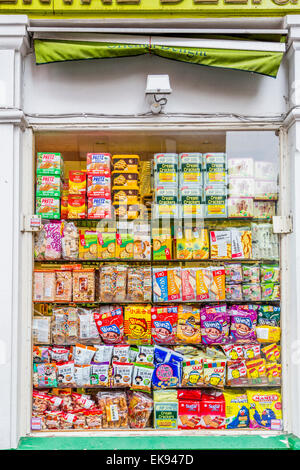 A Colorful Chinese supermarket store window front  stocked with produce Stock Photo