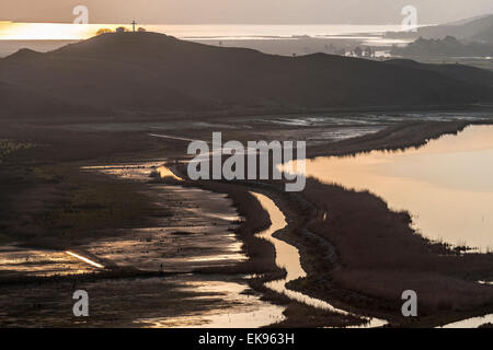 Looking across the Vrina plain wetlands at Butrint National Park, towards the Vivari channel and Butrint, Southern Albania. Stock Photo