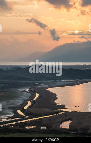 Looking across the Vrina plain wetlands at Butrint National Park, towards the Vivari channel and Butrint, Southern Albania. Stock Photo