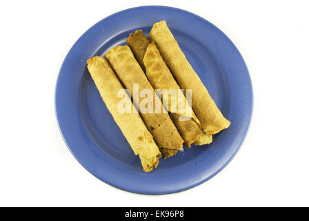 wafer rolls on a plate isolated on white Stock Photo