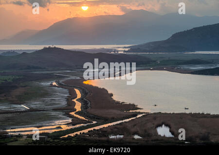 Looking across the Vrina plain wetlands at Butrint National Park, towards the Vivari channel and Butrint, Southern Albania. Stock Photo