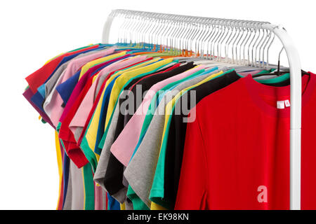 Colored shirts on hangers steel. Isolate on white. Stock Photo