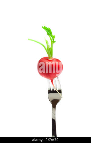 radish on a fork isolated on white Stock Photo