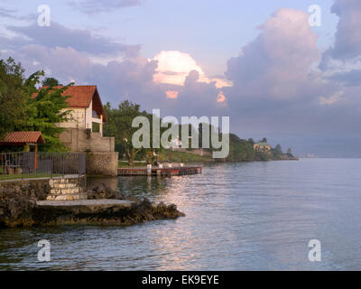 Lake Kivu at Goma, North Kivu Province; Mount Nyriagongo volcano in the ...