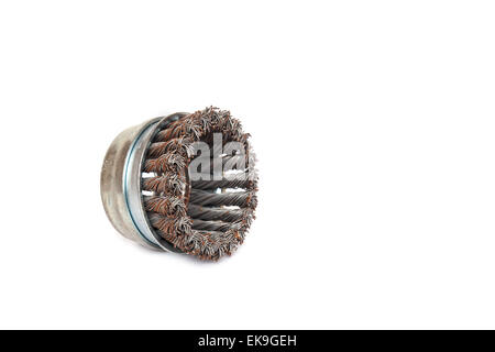 Old rotating metal brush or grinding disk isolated on white background Stock Photo
