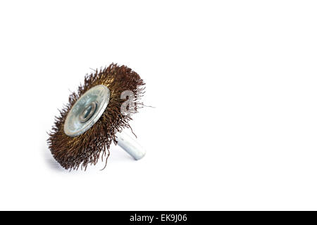 Old rotating metal brush or grinding disk isolated on white background Stock Photo