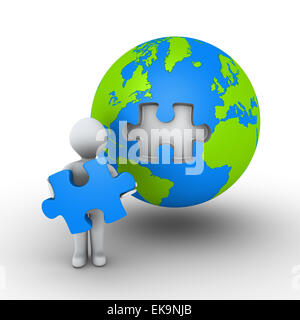 Person holding puzzle piece of earth Stock Photo