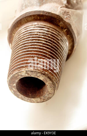 Rusty pipe thread on white background Stock Photo
