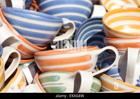 ceramic cups in a basket at the fair Stock Photo