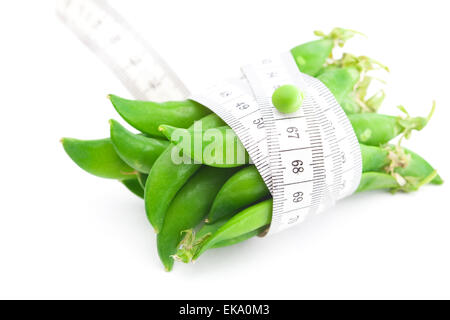 peas and measure tape isolated on white Stock Photo