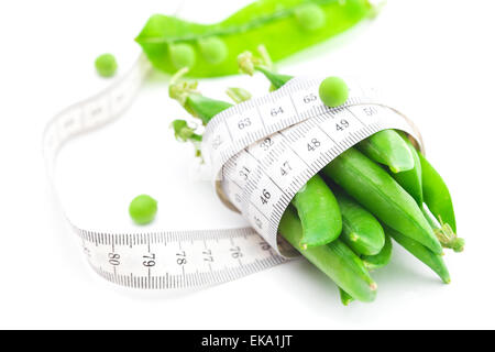 peas and measure tape isolated on white Stock Photo