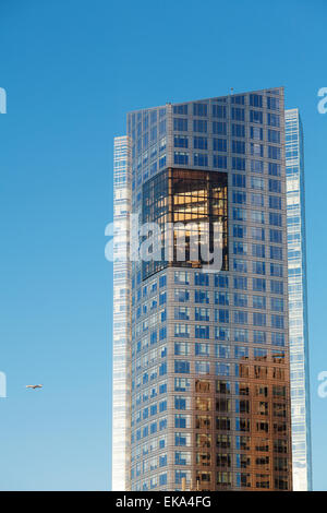 Beautiful modern office building against the blue sky Stock Photo - Alamy
