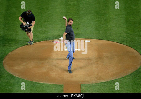 Arizona Diamondbacks pitcher Randy Johnson, right, hugs his