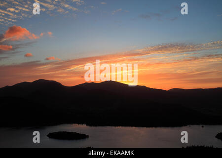 Sunset clouds over Derwentwater, Keswick town, Lake District National Park, Cumbria County, England, UK Stock Photo