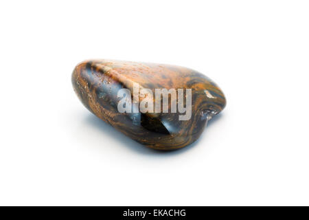 Piece of pietersite originating from Namibia on a white background. Stock Photo