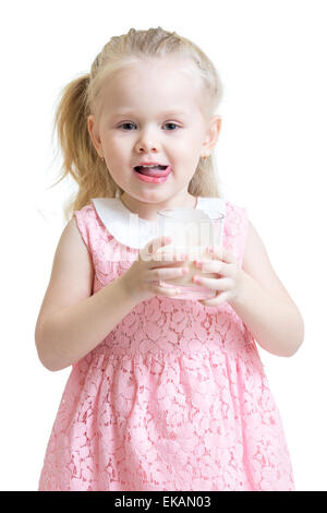 Pretty kid drinking milk from glass Stock Photo