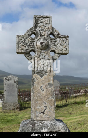 Old carved stone Celtic cross in cemetery, UK Stock Photo