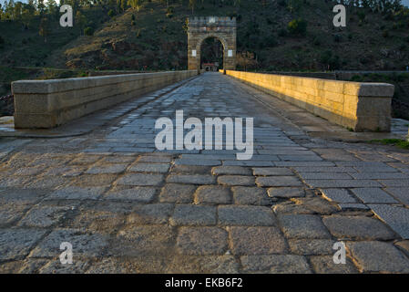 Roman bridge of Alcantara. Dates from de II century B.C. It was very important over the history as a strategic point to cross th Stock Photo