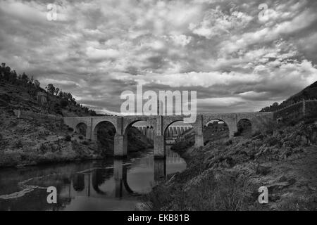 Roman bridge of Alcantara. Dates from de II century B.C. It was very important over the history as a strategic point to cross th Stock Photo