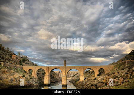 Roman bridge of Alcantara. Dates from de II century B.C. It was very important over the history as a strategic point to cross th Stock Photo