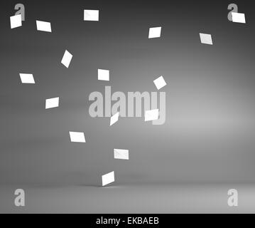 White Mail Envelops Flying in the Air in the Gray Room Stock Photo