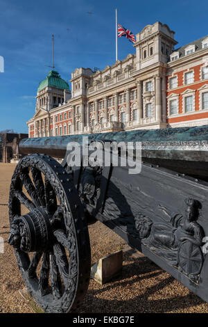 Captured Turkish cannon, Union Flag at half mast on Old Admiralty Building, Horse Guards Parade, Whitehall, London, England, UK Stock Photo