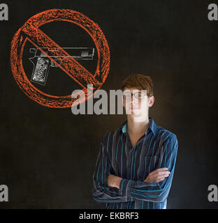 No guns pacifist business man, student, teacher or politician on blackboard background Stock Photo