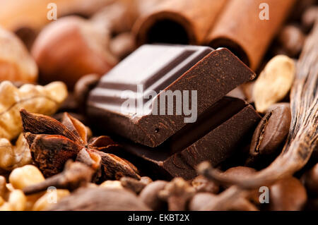 chocolate with coffee beans, spices and nuts Stock Photo