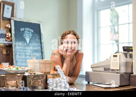 Portrait of female shop keeper in ice cream shop Stock Photo