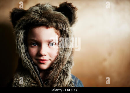 Girl wearing furry hat Stock Photo