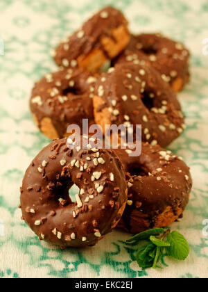 Chocolate cronuts. Recipe available. Stock Photo