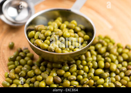 Mung beans over wooden spoon Stock Photo