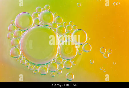 Oil soils on water surface, close-up. Stock Photo