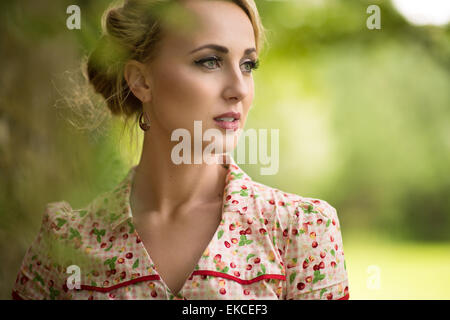 Portrait of a young woman looking away Stock Photo