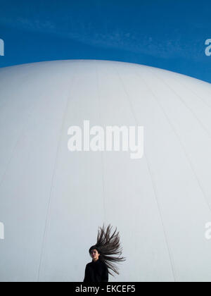 Teenage girl with hair flying in the wind Stock Photo