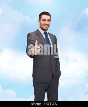 handsome buisnessman showing thumbs up Stock Photo