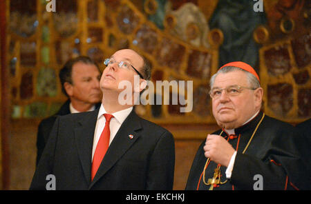 Prague Castle, Czech Republic. 9th Apr, 2015. HSH Prince Albert II of Monaco (centre) accompanied by Dominik Duka, Prague Archbishop and primate of the Czech Catholic Church, visits Saint Vitus Cathedral at Prague Castle, Czech Republic, on Thursday, April 9, 2015. Prince Albert is on two-days official visit to the Czech Republic. © Michal Dolezal/CTK Photo/Alamy Live News Stock Photo