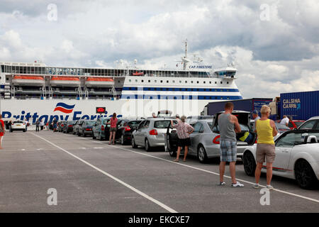 A queue of holidaymakers and their cars in the port at Bilbao, northern Spain, waiting to board a Brittany Ferries ferry Stock Photo