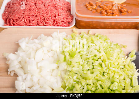 Chili Ingredients of chopped onions, celery with ground beef and kidney beans Stock Photo