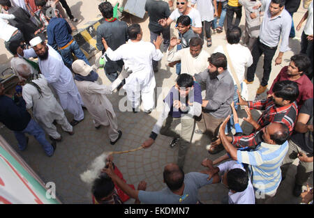 MQM and PTI activists clashing with each other near Nine Zero during ...